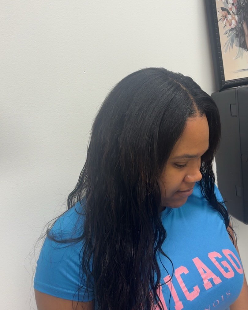 Sewn extensions wavy hair